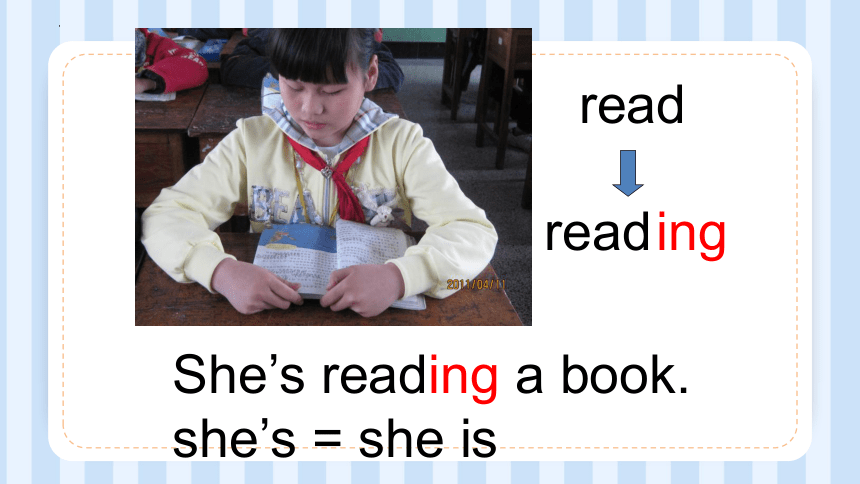 Module 2 Unit 1 She is reading a book. 课件(共14张PPT)