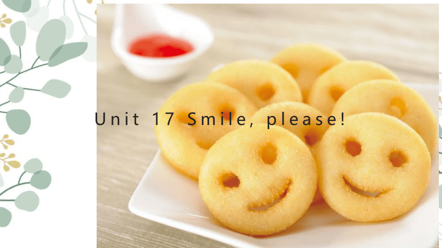 新概念青少版 1B Unit 17 Smile,please! 课件(共32张PPT)